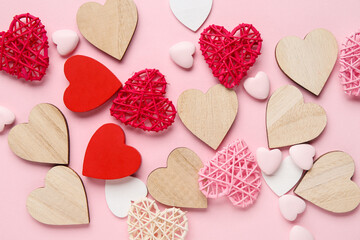 Different heart shaped decor on pink background. Valentine's Day celebration