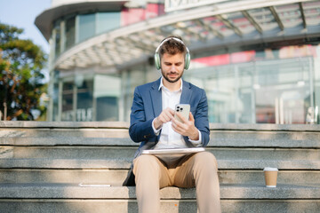 Young business man leader entrepreneur, professional manager holding digital tablet computer