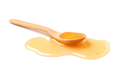Wooden spoon with spilled honey isolated on white background, closeup