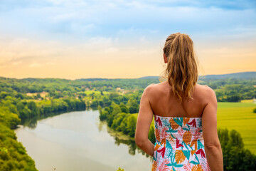 Woman Traveling in France - Scenic Village and River in Dordogne