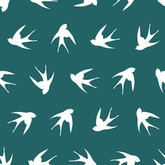 Seamless pattern with swallow silhouette on color background. Cute bird in flight. Vector illustration. Doodle style. Design for invitation, poster, card, fabric, textile.