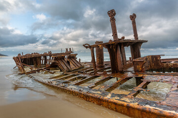 The deck and remaining super structure on the ship wreck of the Steam Ship Maheno on the eastern...