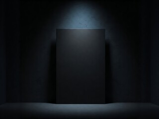 A black paper mockup in a dimly lit room, creating a mysterious and moody atmosphere