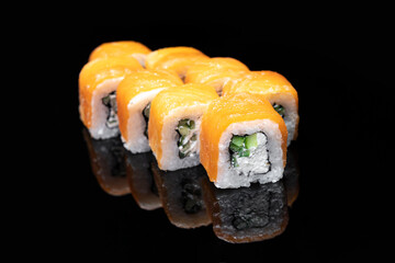 Japanese traditional cuisine. asian food. Philadelphia roll with isolated on black background