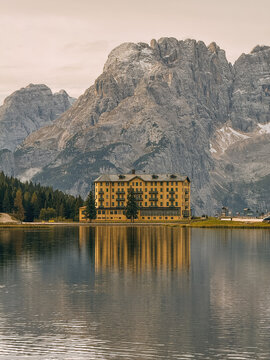Luxurious hotel on a lake in the Dolomitas mountains