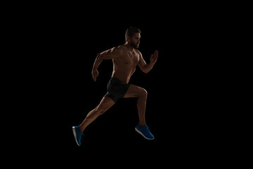 Sportsman runner running isolated black. Sport run. Muscular man running. Sportsman jogger running. Man sportsman running for exercise. Sport athlete man run. Runner at long sport run. Cardio fitness