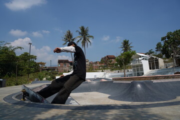 skateboarder with his signature trick at a skatepark