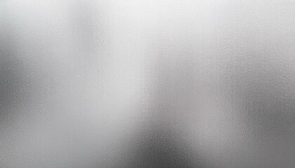 bright grainy metallic silver gradient aluminum texture abstract blurry monochrome frosted glass effect background
