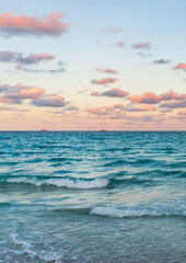 Fototapeta premium Sea horizon view. Cloudy sky and seascape at summer vacation. Skyscape with sea horizon. Calm horizon view at sea sunrise. Romantic summer vacation sunrise on seascape. Distant sea horizon