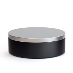 Black and Silver Cylindrical Display: A Low, Round, Black Cylinder with a Silver Top, Isolated on a White Background, Ideal for Product Photography, Mockups, or Showcasing Modern and Minimalist Design