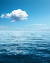 Obraz premium A vast, calm sea under the blue sky, with a white cloud in sky. The water is deep and serene, reflecting the clear sky above it. 