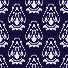 ikat pattern and fabric. Abstract background for wallpaper, textures, textile.