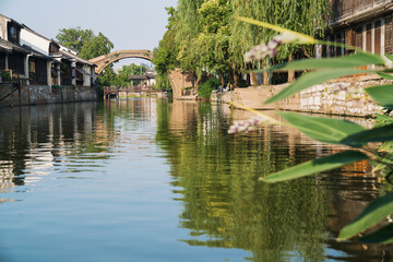 Obraz premium Old houses, rivers, and bridges in Zhouzhuang Ancient Town, Suzhou City, Jiangsu Province, China On April 18th, 2023