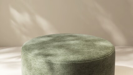 Green round fabric cushion stool podium table in dappled sunlight on beige wall, floor for modern, luxury and elegant cosmetic, skincare, body care, beauty product display background 3D