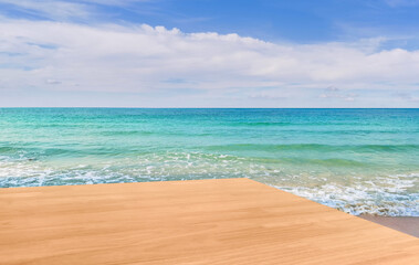 Wooden or wood table corner, background with sea and sky.