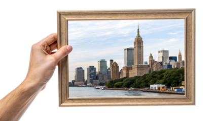hand holding a picture of city