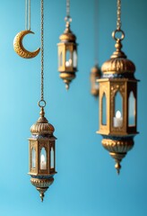 Obraz premium Decorative lanterns and crescent moon ornament hanging against a blue backdrop, Ramadan celebration