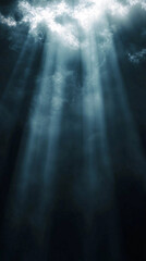 Mystical beams of light shine down through dark clouds creating a dramatic and ethereal atmosphere with a sense of depth and mystery  
