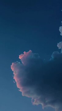 Majestic sunset clouds morphing in vibrant evening sky horizon