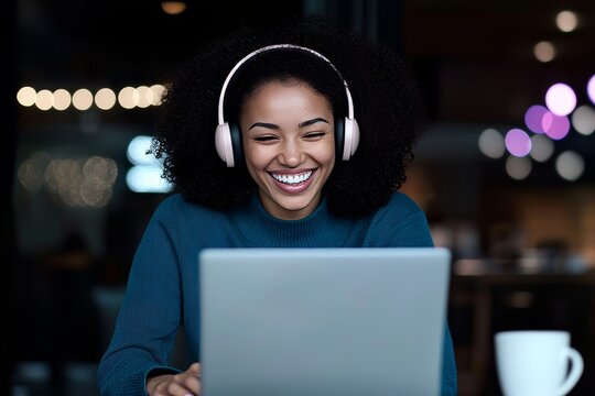 A student with high academic ability learns by accessing online information while wearing headphones