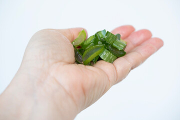 Slices aloe vera, natural remedy with anti-inflammatory and antioxidant properties, ready to soothe...
