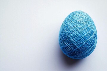 Fototapeta premium Blue Yarn Easter Egg Decorative Craft