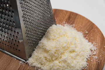 Fine crumbs of hard Parmesan cheese