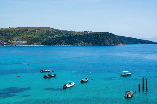 Boats in Himare Bay on the coast of southern Albania, part of the Albanian Riviera. Located in Vlore County, it lies between the Ceraunian Mountains and the Ionian Sea and is a major tourism centre