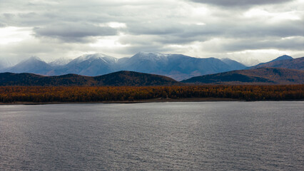 Aerial view of the rugged and serene shoreline of Northern Lake Baikal, highlighting its untouched natural beauty 