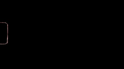 A classic vintage film camera elegantly displayed against a strikingly simple black background for emphasis with super 8 frame hole.