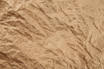 Brown crumpled paper background vignette