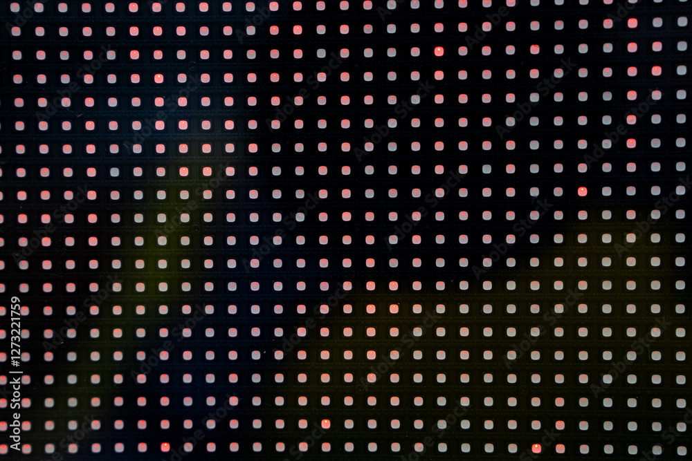 Wall mural led light grid with red and green dots creating abstract digital pattern.