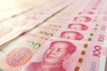 Closeup of China's one hundred. Currency notes in high-resolution on a plain background. Also known as Renminbi RMB or Yuan.