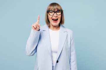 Blonde successful employee business woman 50s wear classic suit glasses formal clothes hold index...