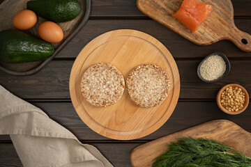 Two healthy gluten-free buckwheat crispbread ready for making sandwiches, top view. Dietary and healthy vegetarian eating.