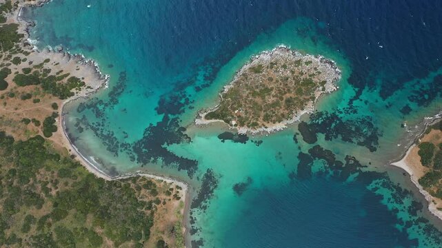 Aerial view of islands in the sea. Beautiful shallow sea with turquoise water. Nature of Turkey