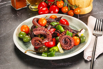 Salad with octopus tentacle and vegetables