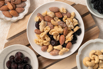 Flavored mixed nuts in bowls.