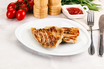 Grilled pork steak with sauce