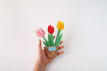 step-by-step process of making paper tulips. Great for handmade decor, school projects, and seasonal designs. Ideal for craft businesses, educational platforms, and creative marketing