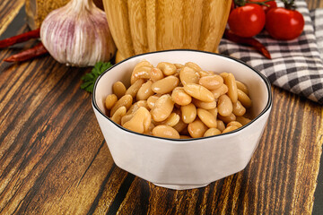 Baked white canned beans in the bowl