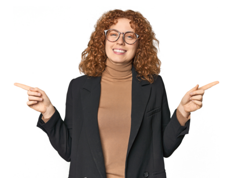 Young Caucasian redhead in business attire pointing to different copy spaces, choosing one of them, showing with finger.