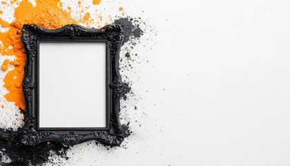 An ornate black frame surrounded by vibrant splashes of color on a blank canvas.