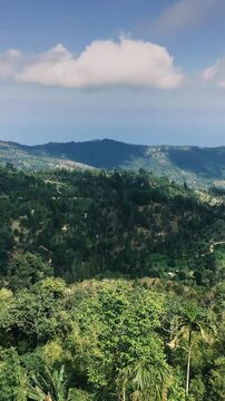 Timelapse view of the mountains of a tropical island