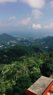 View from the height of the island to the mountains and the sea