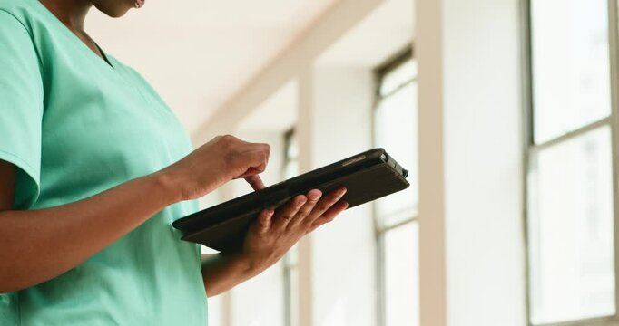 Nurse Using Tablet in Hospital: Modern Healthcare, Digital Records, Patient Care, Medical Technology