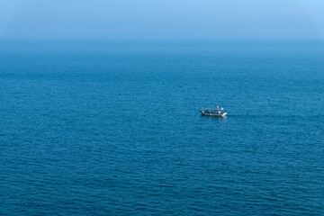 fishing boat sailing on the sea