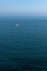 fishing boat sailing on the sea