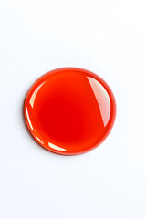 Red liquid or paint circle drop isolated on white background