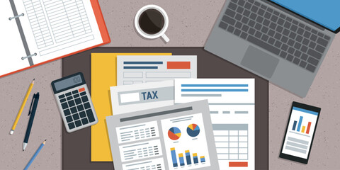 Business and finance desktop with supplies and computer